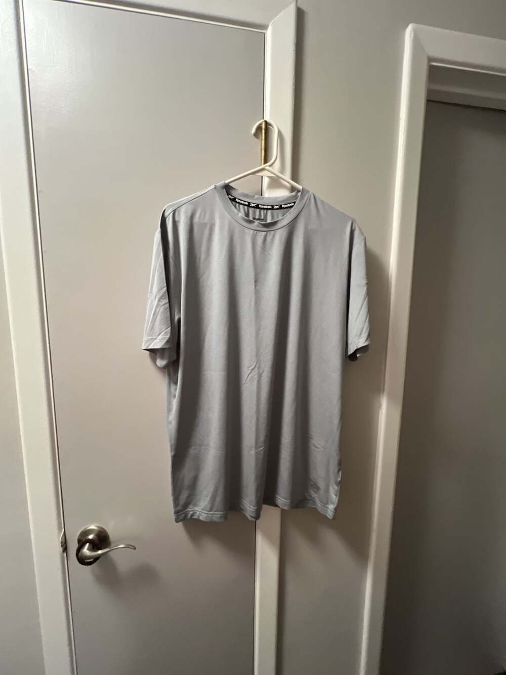Reebok Performance short sleeve shirt Gray
 90% polyester 10% spandex